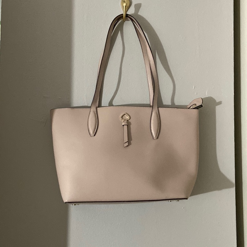Light a pink Kate Spade Purse